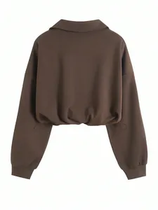 Back view of brown long sleeve cropped sweatshirt with polo collar and elastic waist