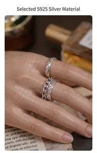 Close-up of S925 silver stackable rings in retro Thai silver style for women