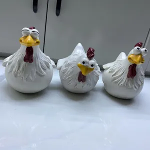 Detailed view of goofy resin chicken garden ornaments with funny expressions