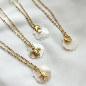 Set of four 18K gold plated stainless steel necklaces featuring sea shell and creature charms.