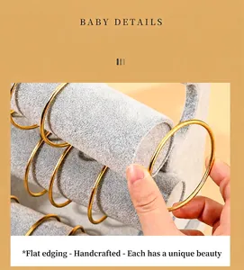 Detailed macro view showing the soft gray velvet texture of the three-layer jewelry display stand