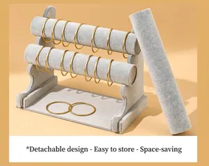 Detail showing 3-tier gray velvet bracelet stand with its detachable roller design