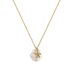 Ocean theme gold starfish and shell pendant necklace for women on white background