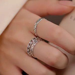 Vintage S925 sterling silver stackable open rings featuring quilted and link chain patterns