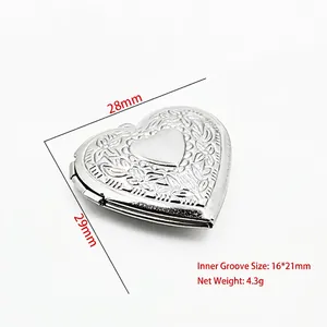 Detailed macro view of heart-shaped stainless steel photo locket with size measurements