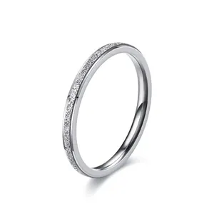 Minimalist silver frosted stainless steel ring for women in a sleek band design