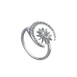 Elegant silver adjustable ring featuring a sparkling crescent moon and sun design