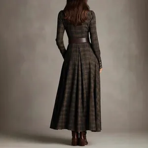 Elegant brown plaid long-sleeved maxi dress with waist belt and pleated skirt