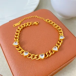 Detailed view of a gold-plated titanium steel necklace featuring radiant heart-shaped zircons.