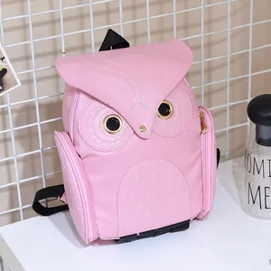 Pink cartoon owl-shaped backpack for women featuring 3D stitching and large eyes
