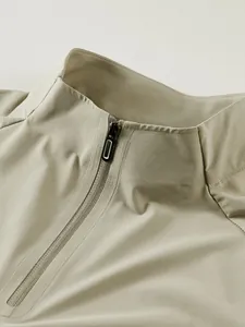 Close-up of men's quick-dry outdoor sports shirt with quarter-zip and stand collar