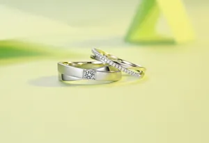 Close-up of S925 silver moissanite wedding rings for couples with elegant matte finish