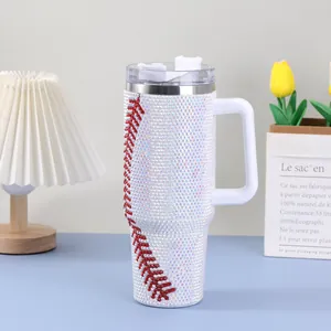 Detailed macro view of a 40oz baseball rhinestone tumbler featuring a white handle.