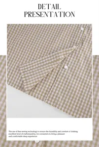 Makroansicht der feinen Nähte und weißen Knöpfe an einem beige karierten Baumwollschlafanzug