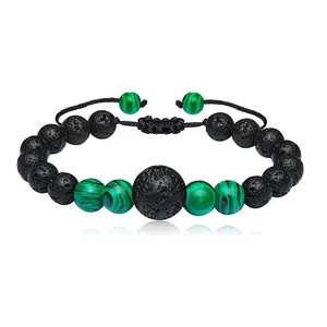 Handmade adjustable woven bracelet featuring black lava stone and green malachite beads
