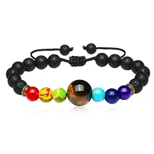 Close-up detail of an adjustable chakra bracelet featuring tiger eye and lava stone beads