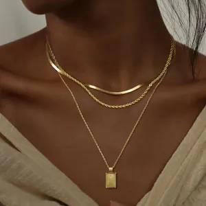 Elegant 14K gold plated three-layer necklace set with snake, rope and rectangular pendant.