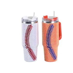 Two 40oz rhinestone baseball tumblers in white and orange with straws and handles