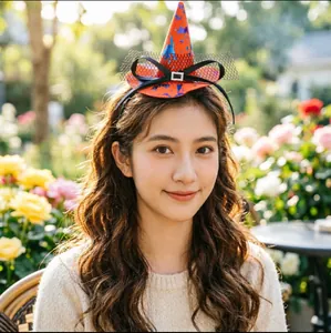Classic Halloween witch hat headband featuring orange splatter pattern and mesh veil