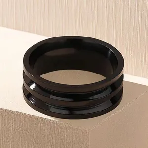 Sleek black titanium steel triple stacked ring for men featuring a mirror polished finish