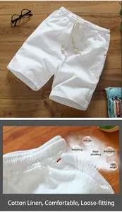 Close-up detail of white men's linen shorts showing breathable fabric texture and drawstring.