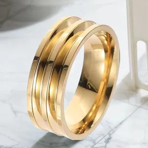 Minimalist polished gold titanium steel band ring with unique triple grooved design