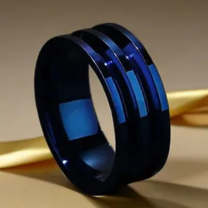 Close-up of a blue titanium steel ring with a triple-stripe grooved design for men