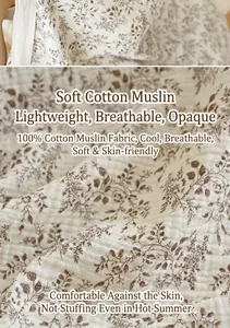 Detailed close-up of 100% cotton gauze nursing cover fabric with brown floral pattern