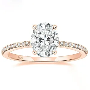 Macro detail of an elegant rose gold ring featuring a 3 carat oval stone and pave set band.
