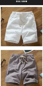 Detailed view of breathable cotton linen drawstring shorts for men in white and grey