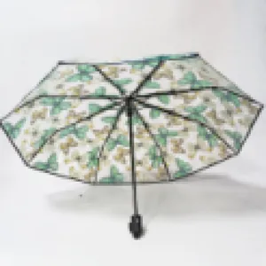Folding transparent umbrella featuring green butterfly floral print pattern for rain