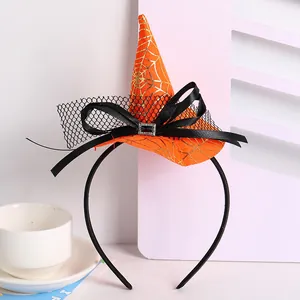 Orange Halloween witch hat headband with gold spiderweb pattern and black bow