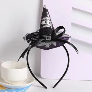 Close-up detail of purple Halloween witch hat headband with black ribbon bow and mesh