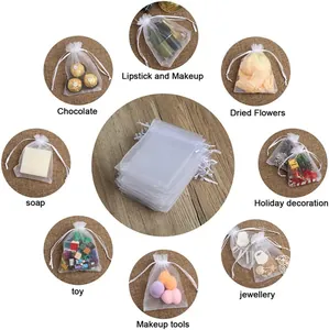 White organza drawstring bags showing usage for jewelry, candy, and makeup.