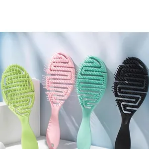 Selection of colorful hollowed out vented massage hair brushes for scalp care and styling