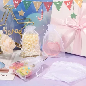 Premium white organza drawstring gift bags for jewelry pearls and perfume packaging