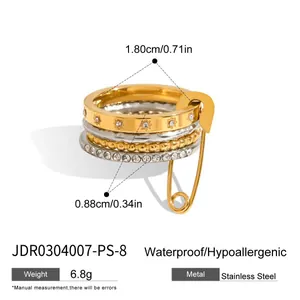 Detail view of stacked stainless steel safety pin ring with size measurements