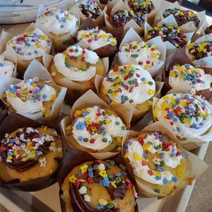 Brown and white tulip cupcake liners with greaseproof paper for professional baking results