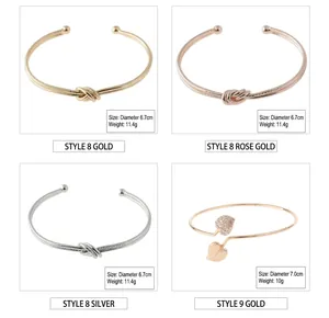 Detailed view of minimalist knot and leaf design open bracelets in various metal finishes
