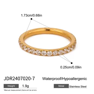 Detailed view of gold stainless steel ring with width and diameter measurements specifications