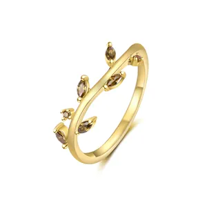 Detailed view of the S925 sterling silver gold-plated vine ring with brown zircons.