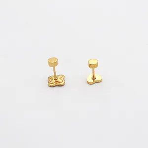 Pair of gold-plated stainless steel stud earrings featuring heart and cross shapes