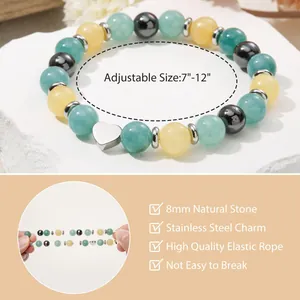 Detailed view of the 8mm natural stone heart bracelet with adjustable elastic rope.