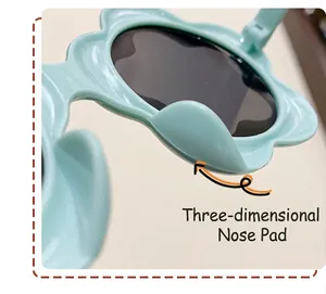 Close-up detail of the comfortable nose pad design on mint green baby sunglasses