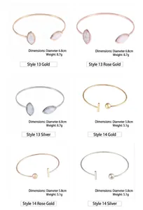 Detail view of diverse minimalist open cuff bangles in gold and silver finishes.