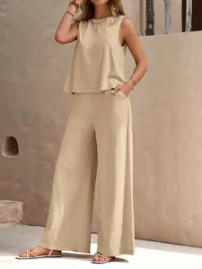 Summer casual two-piece set featuring sleeveless round neck top and wide-leg cotton pants