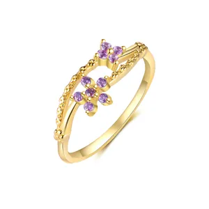 Detailed view of an S925 silver ring featuring purple zircon flowers and golden finish