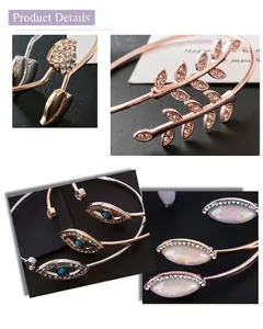 Close-up details of minimalist leaf and marquise eye open cuff bracelets with rhinestones