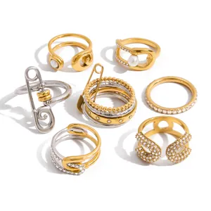 Unique stainless steel paperclip and safety pin rings set in gold and silver finish