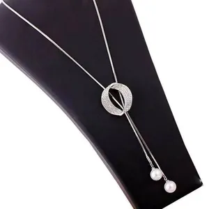 Elegant titanium steel long necklace with sparkly rhinestone circle and pearl drops.